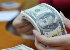 Công dân Việt Nam có được cất giữ và giao dịch bằng ngoại tệ trên  lãnh thổ Việt Nam không?